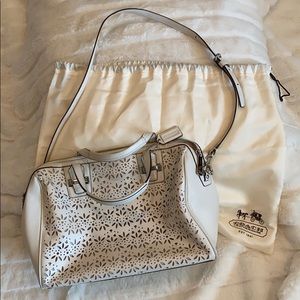 Coach cream colored leather cut-out handbag